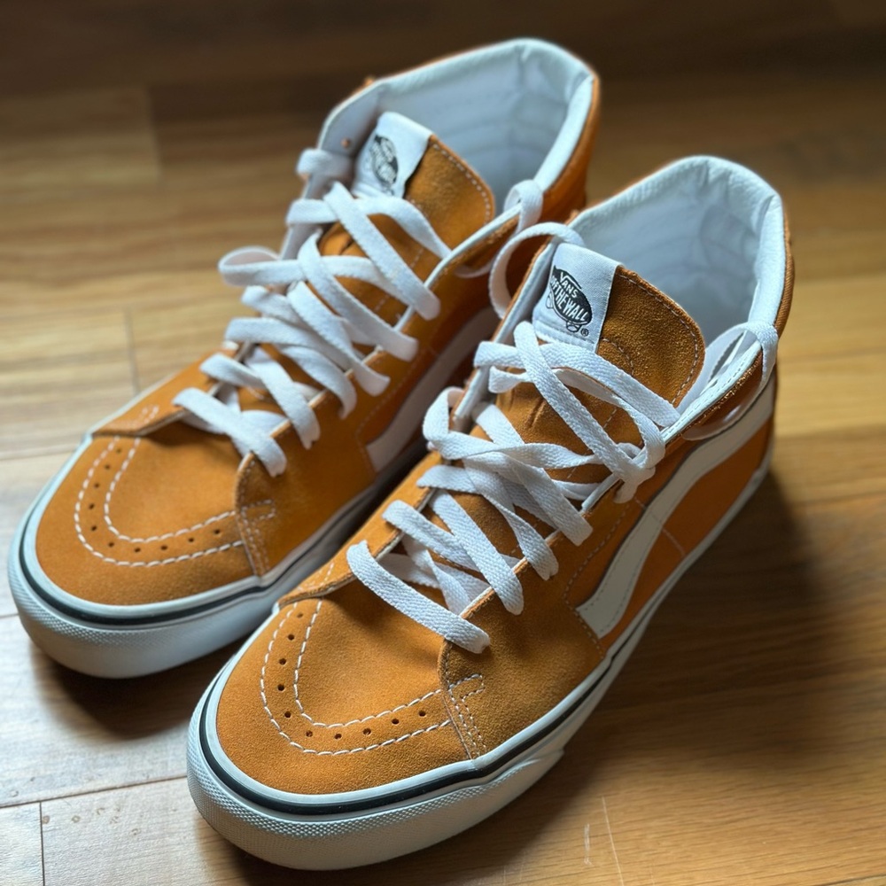 Vans womens Orange and White High-Top Sneakers